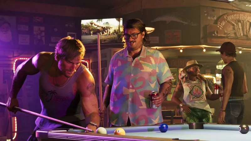 Cal Hampton watches Jason take a shot at a bar pool table