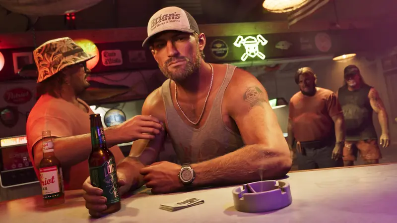 Jason in a trucker cap drinks beer at a bar with his friends