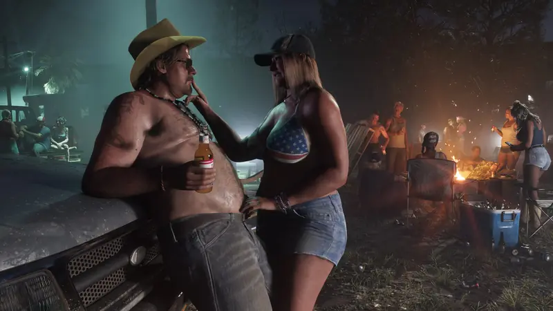 A man in a cowboy hat leans on a truck at a bonfire party at night