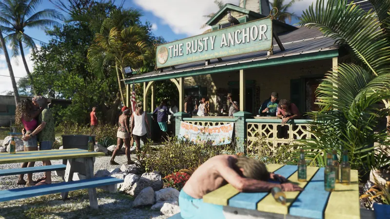 Locals drink outside The Rusty Anchor bar in Key Lento while one sleeps on a picnic table